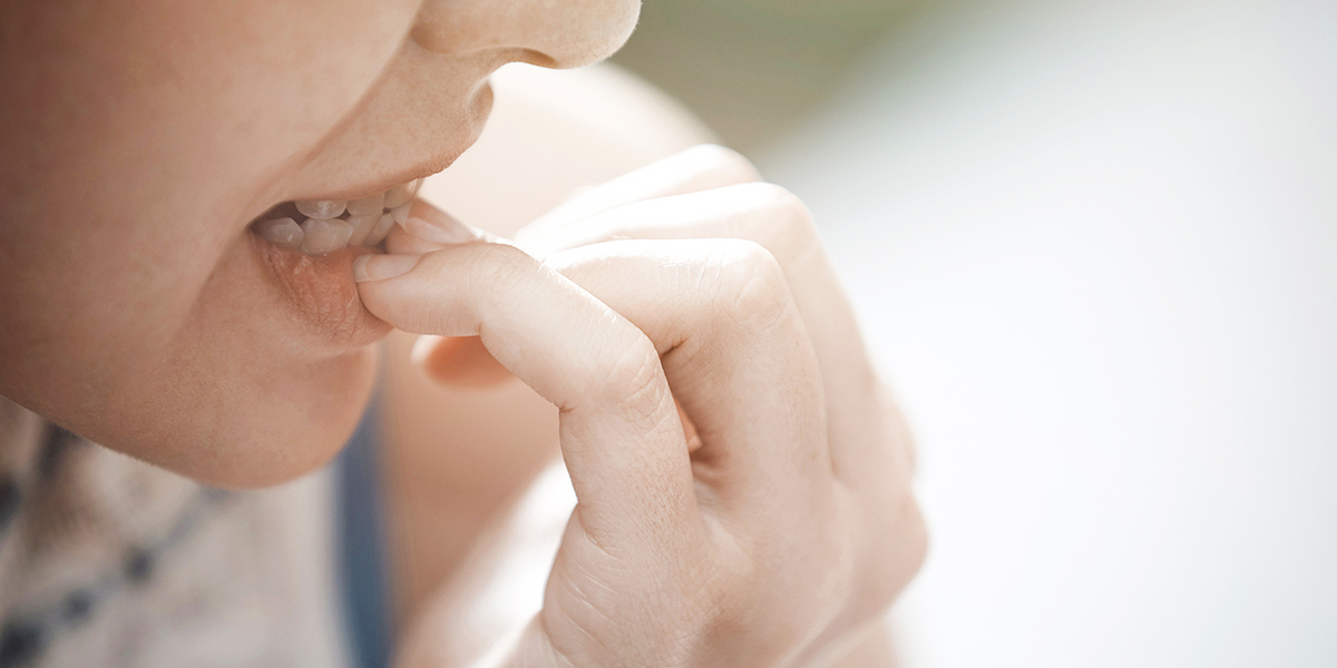 BITING NAILS