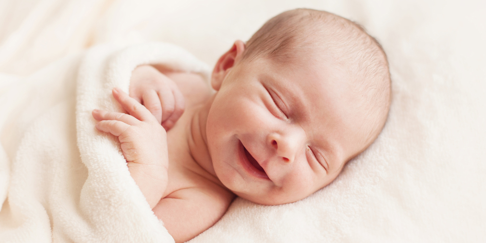 NEWBORN SMILE