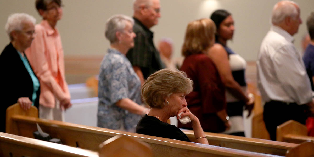 COMMUNION LINE,WOMAN SITTING IN PEW